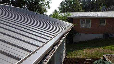 do metal roof houses need gutters|installing gutters on metal roof.